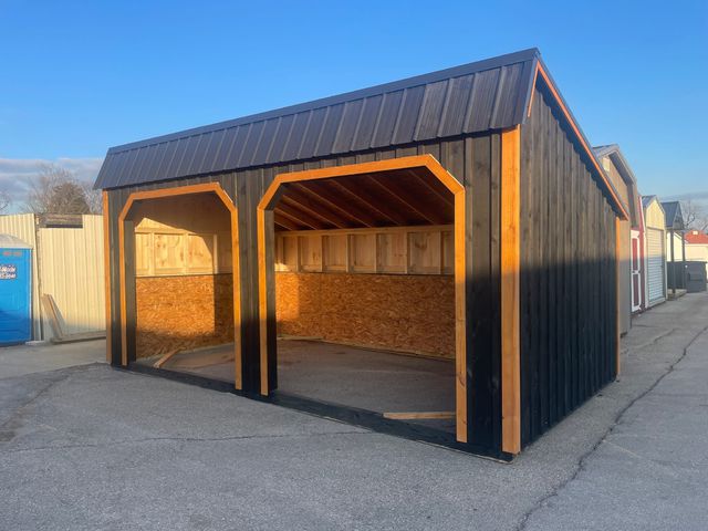 Two-bay run-in horse shelter with cedar trim