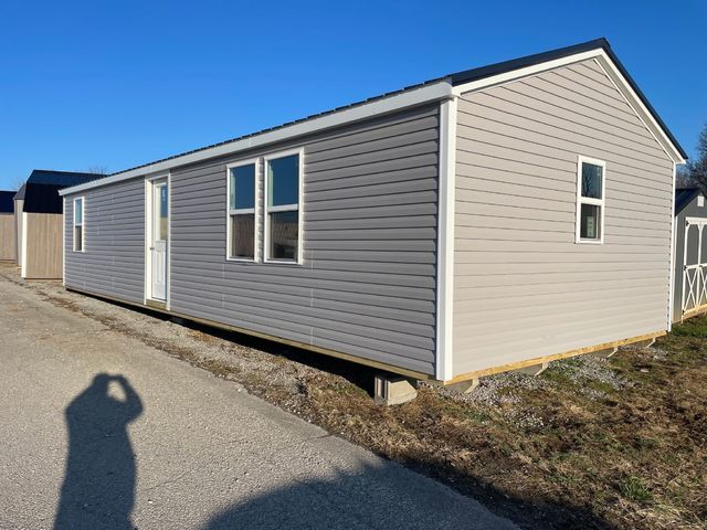 Gray vinyl cabin with 9-lite entry door